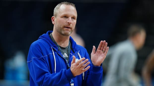 Drake Bulldogs head coach Darian DeVries on the court during first round practice at MVP Arena in Albany, New York, on March 16, 2023.